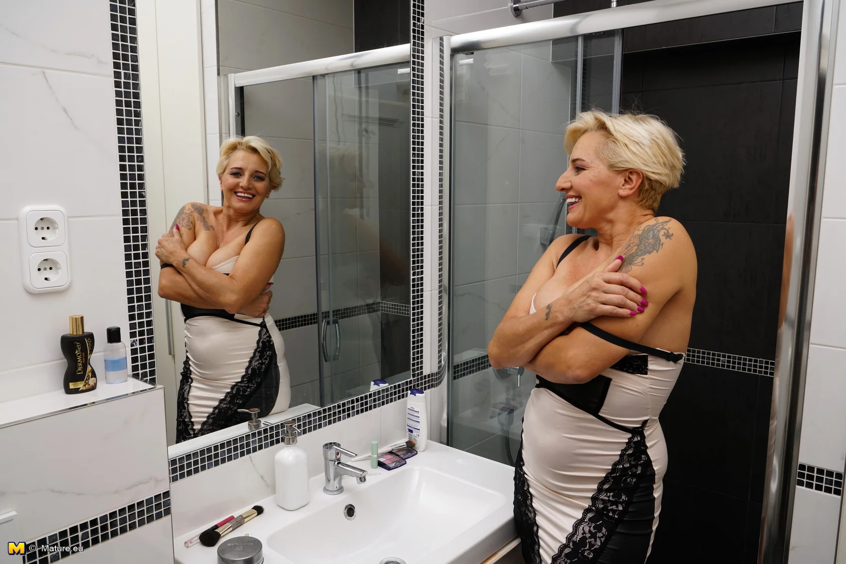 Naughty housewife getting extra wet under the shower