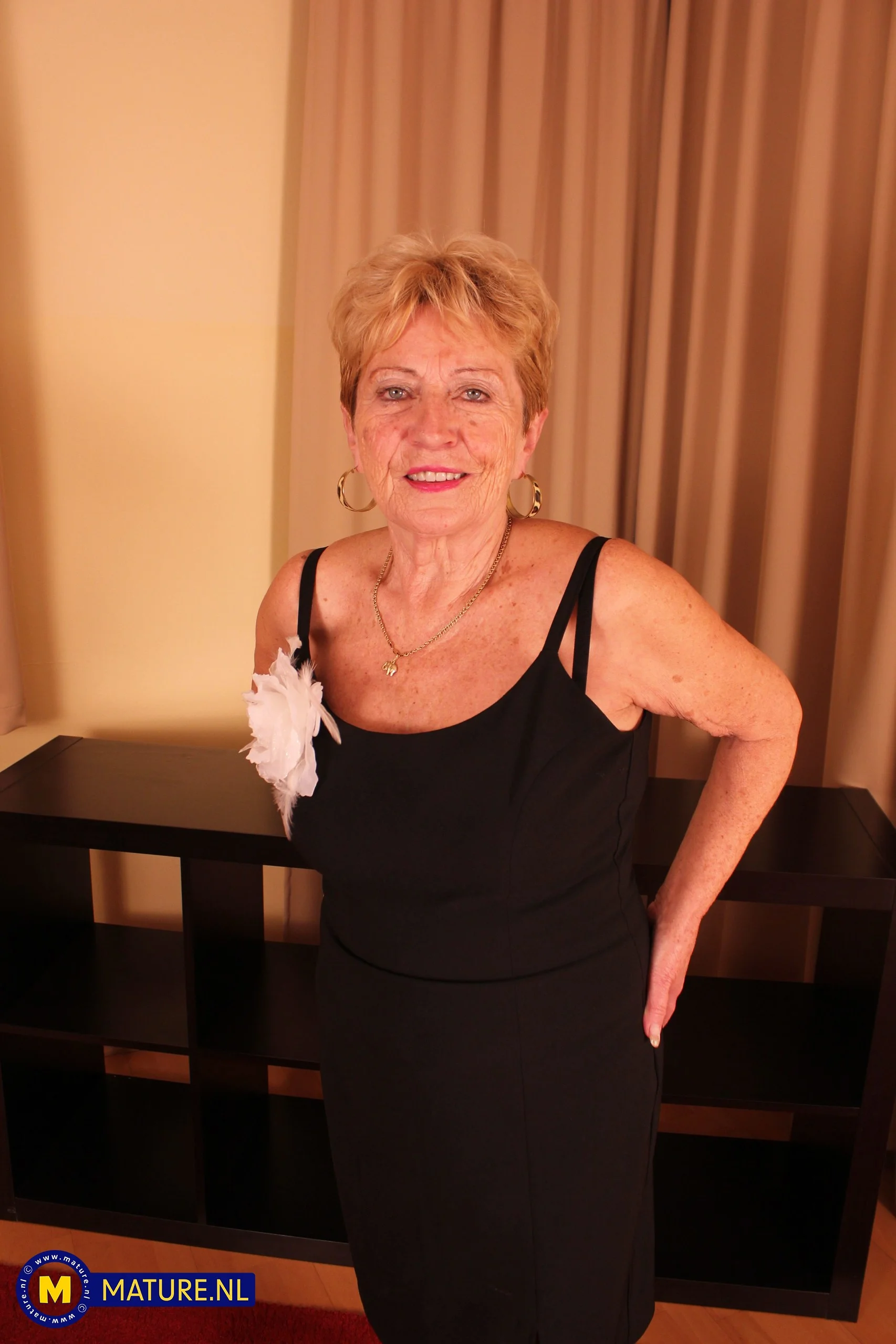 Marina T. is a 70 year old cockhungry grandma who wants to fuck the neighbors hard cock off!