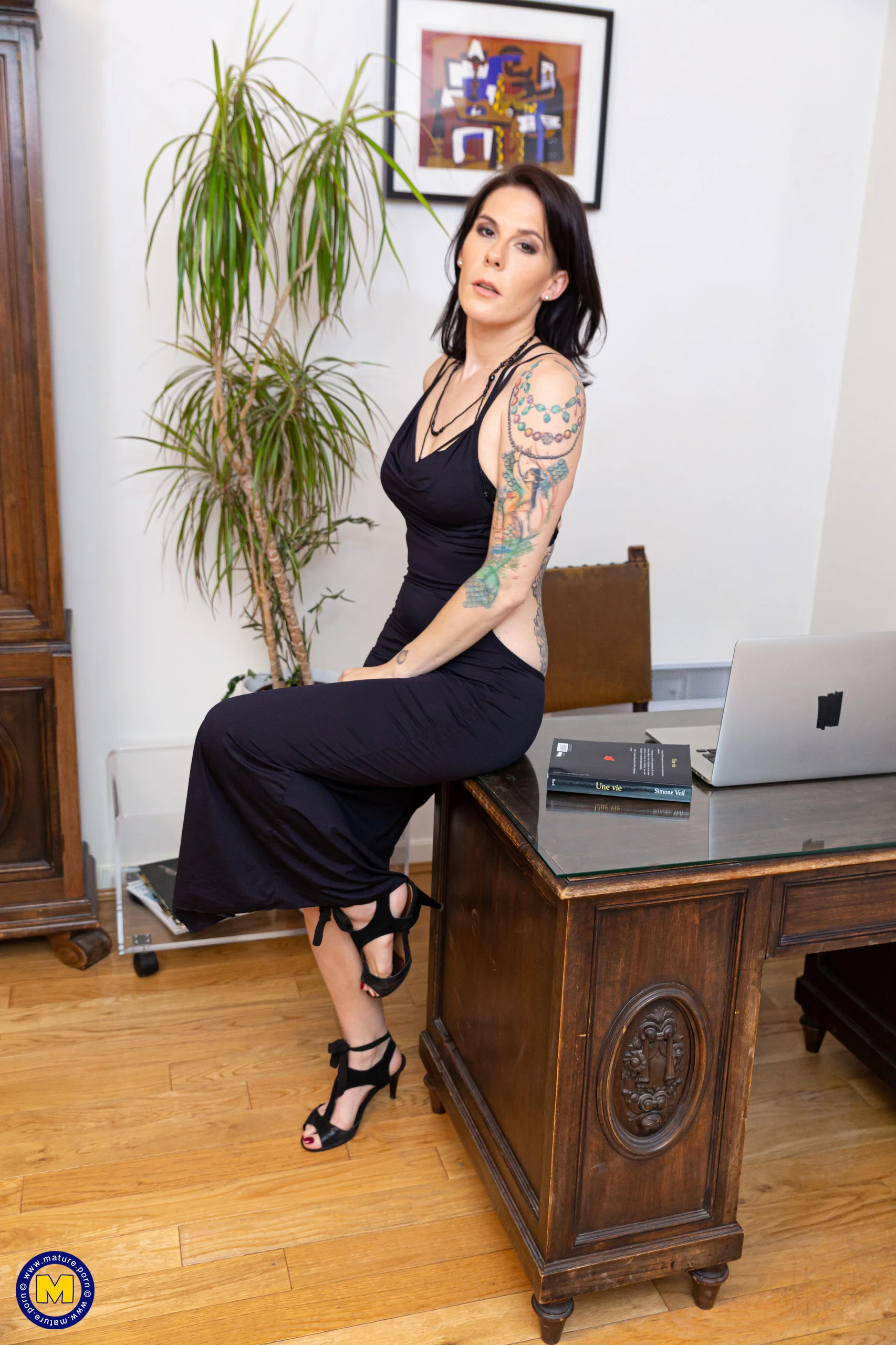 Naughty French mom Camille is masturbating at the office