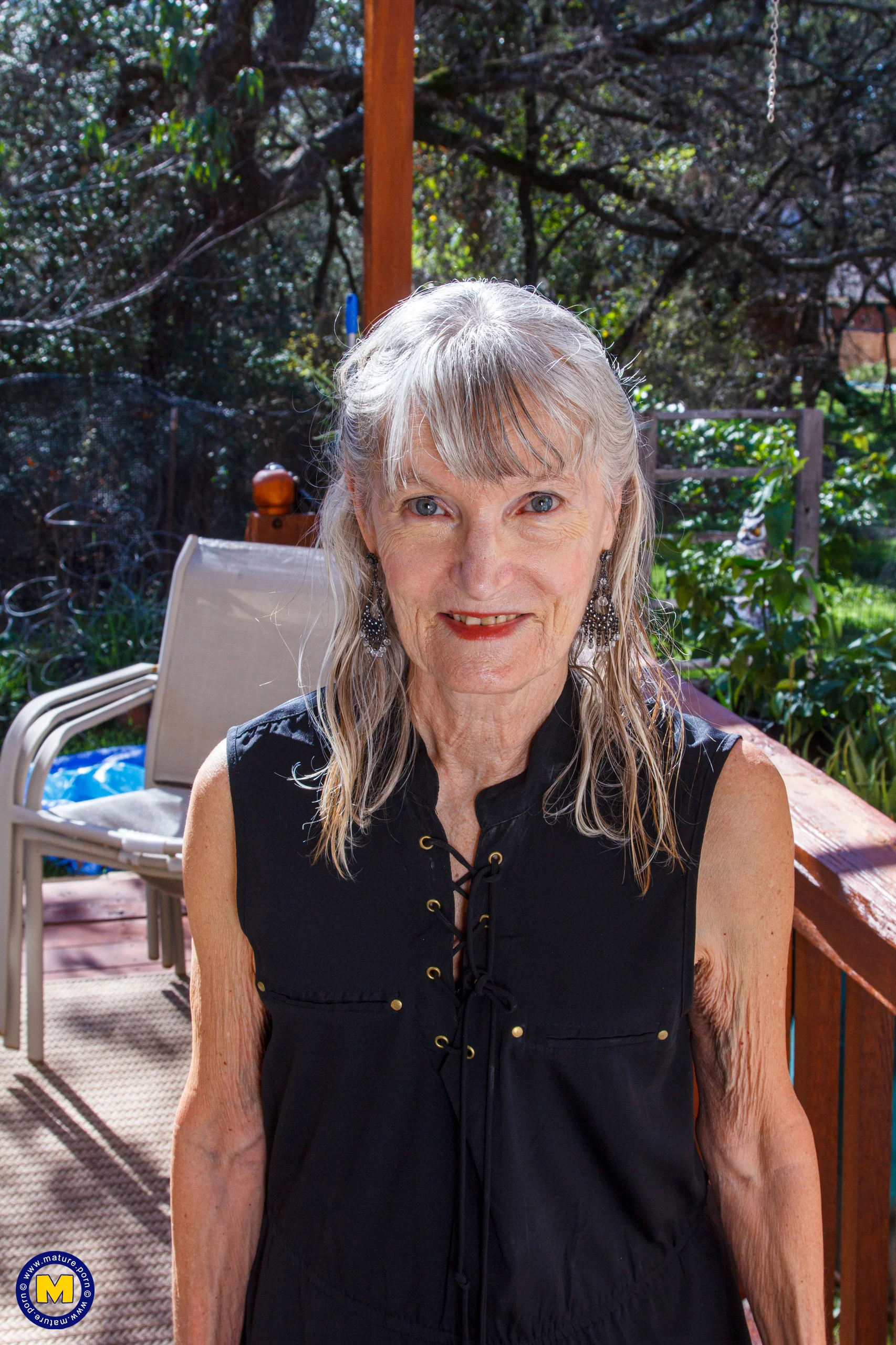 American saggy tits granny Candis loves masturbating on the couch