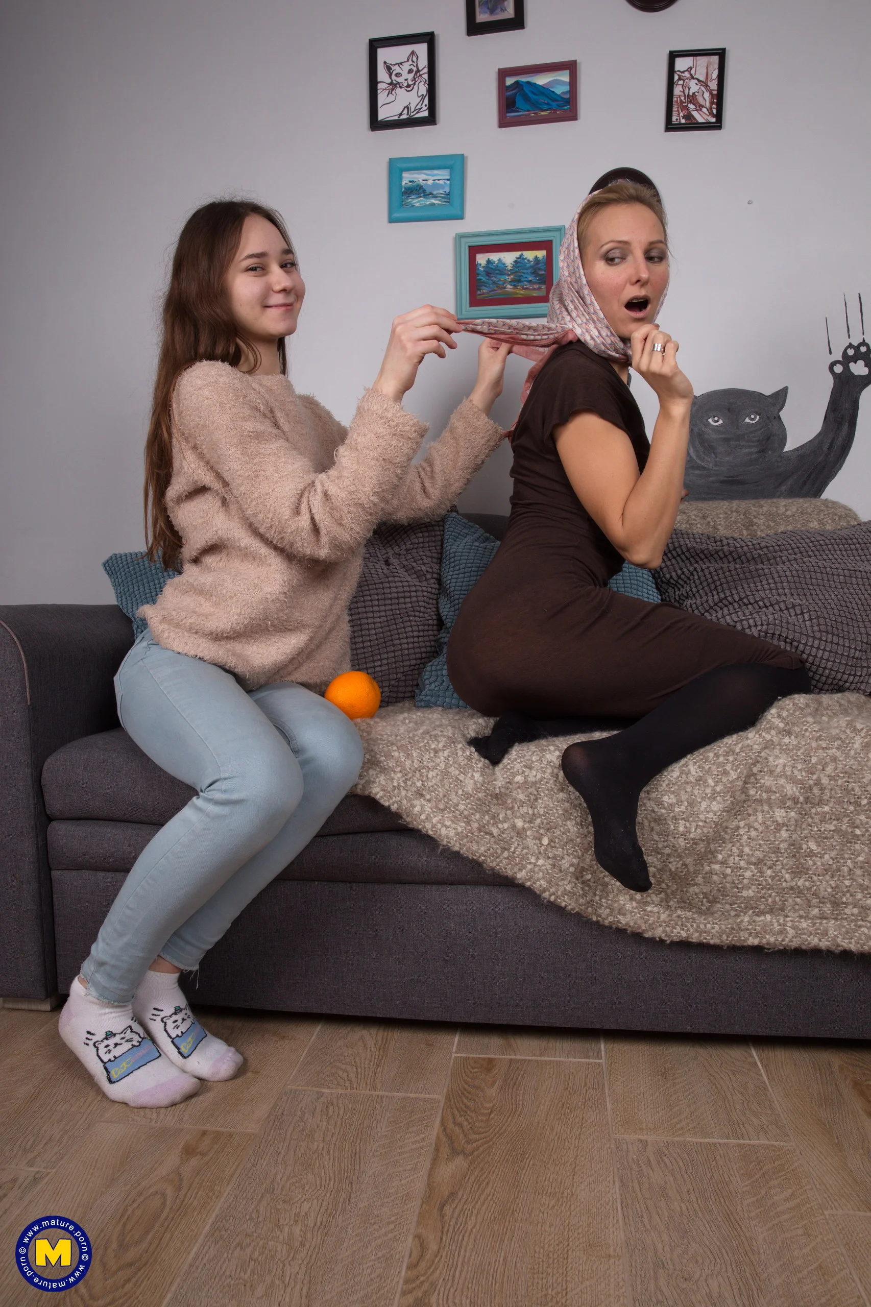 Naughty MILF having fun scissoring a steamy hot teeny babe