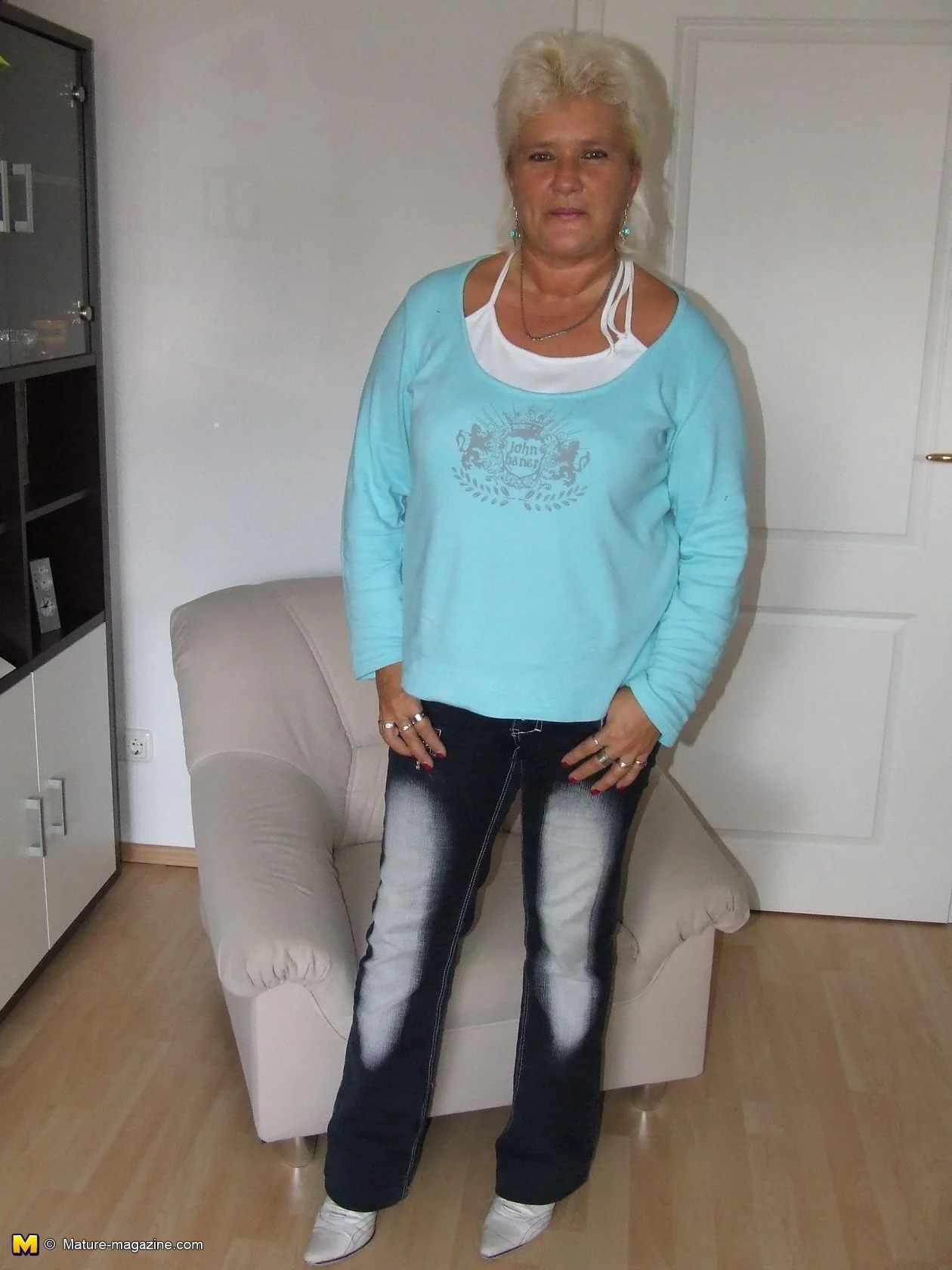 Blonde chubby mature slut showing off her rack