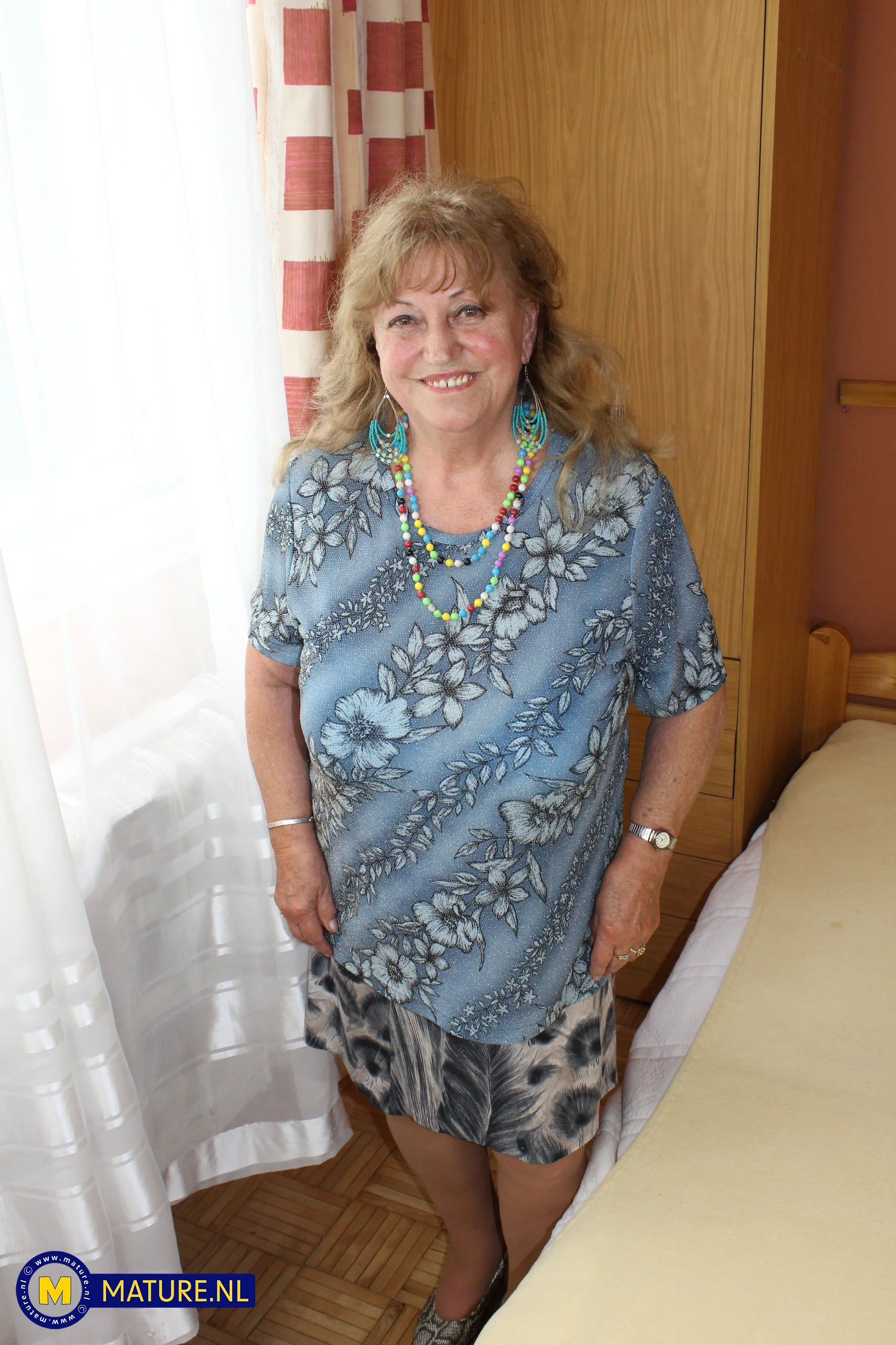 Katerina is a curvy 73 year old granny with big saggy tits who fucks the young man next door