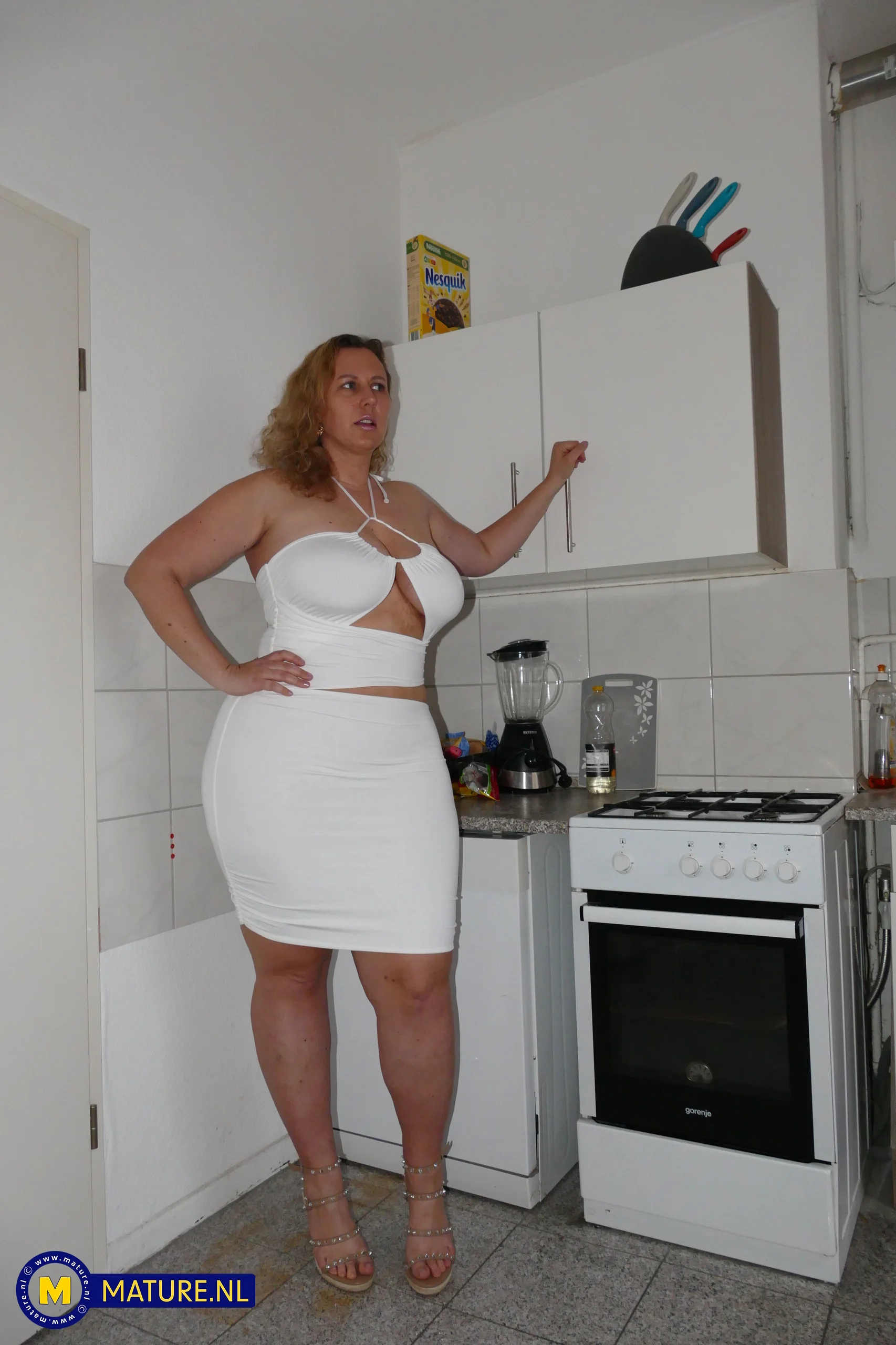 Thick German MILF Kathy D. has a big ass and tits she uses to seduce the handyman into sex at home