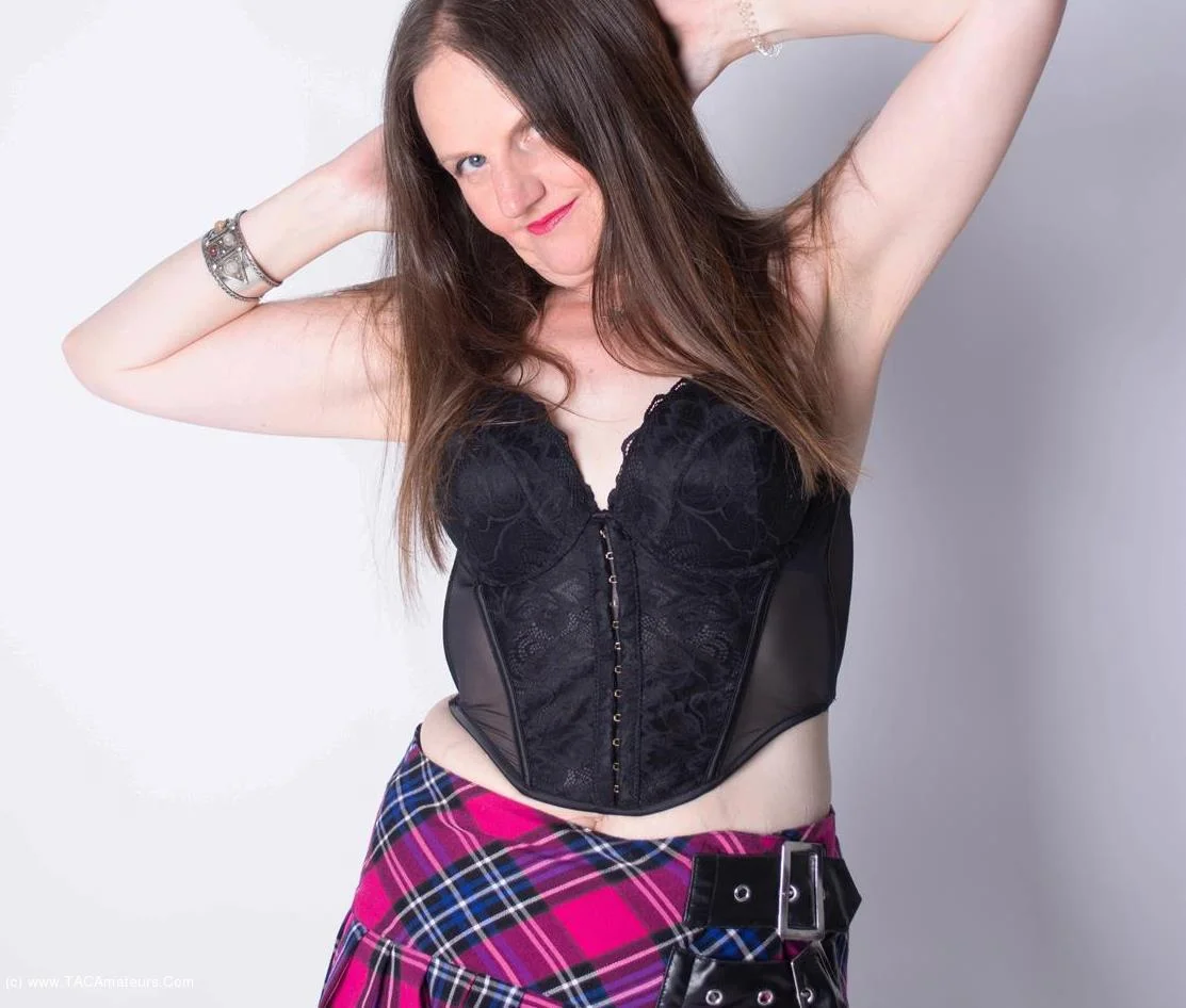 Fishnet Tights and Tartan Miniskirt